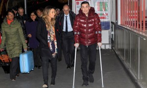 BACK ON HIS FEET.BOXER ANTHONY CROLLA ARRIVES IN LONDON  AT EUSTON STATION WITH PARTNER FRANCHESCA SANDERSON ON HIS FIRST PUBLIC APPEARANCE AFTER BEING INJURED AS HE HEROICALLY TACKLED BURGLARS AT HIS NEIGHBOURS HOUSE. PIC;LAWRENCE LUSTIG