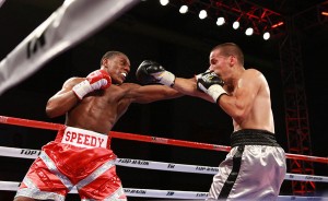 Rashidi Ellis with red trunks